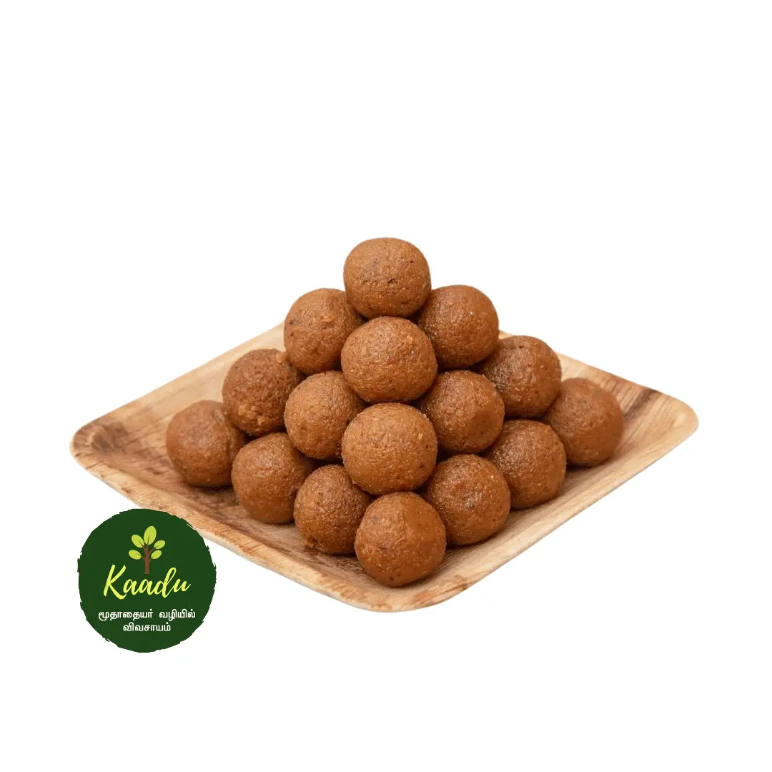 A plate filled with red rice laddu, a traditional sweet, placed neatly without any wrappers. The laddu are round and have a brown appearance.