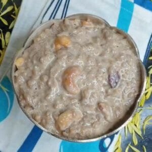 Navara Aval Payasam served in a bowl, garnished with golden roasted cashews.
